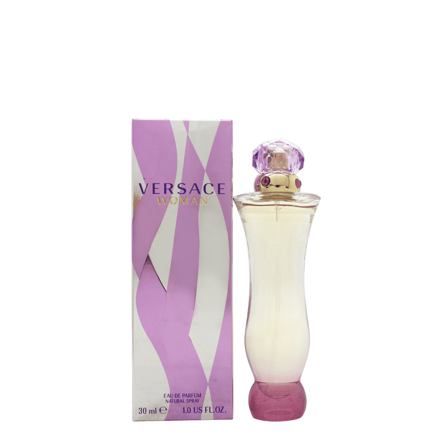 Versace Woman Eau de Parfum spray med en träig doft.